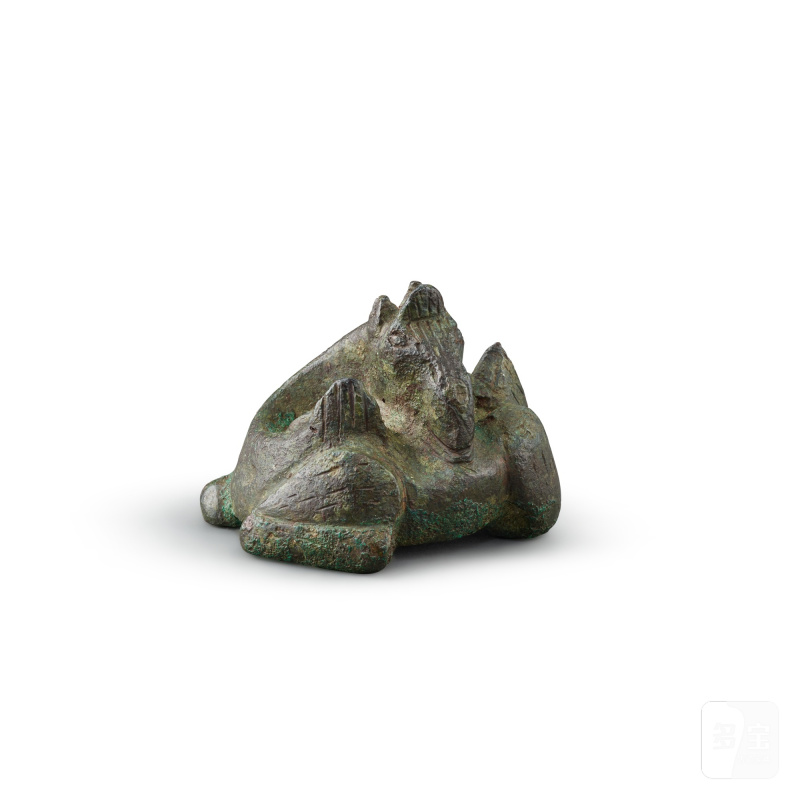 An archaic bronze 'mythical beast' weight, Han dynasty | 漢 青銅異獸席鎮